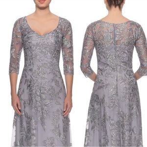 LaFemme 14 silver embroidered long gown hemmed for 5’6” but not worn-has tags